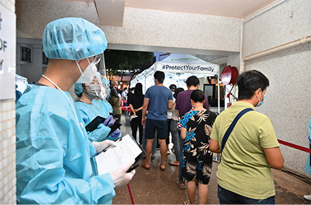 About 100 civil servants and non-civil service contract staff of the Registration and Electoral Office conducted "RTD" operation at Block 34, Heng Fa Chuen in Chai Wan on 28 May 2022.