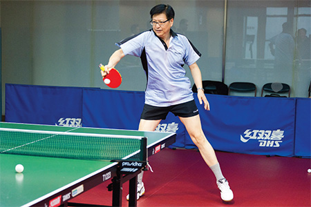 Sr Wong enjoys playing table tennis after his retirement.