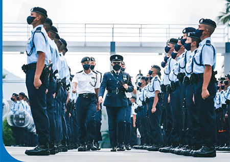 Mr Wong officiated the passing out parade of Police Tactical Unit's Bravo Company in July 2021.