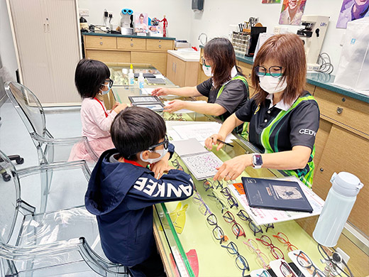 Volunteers performed basic vision tests for the children.