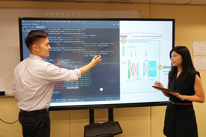 Two statisticians were inspecting AI programme code for compiling trade statistics. 